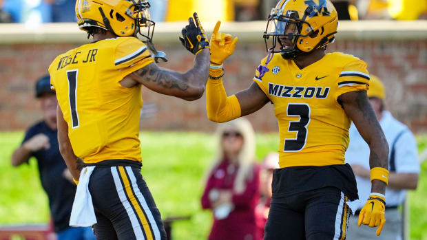 Missouri Tigers wide receiver Luther Burden III (3) celebrates with wide receiver Theo Wease Jr. (1) after scoring a touchdown against the South Carolina Gamecocks during the first half at Faurot Field at Memorial Stadium.